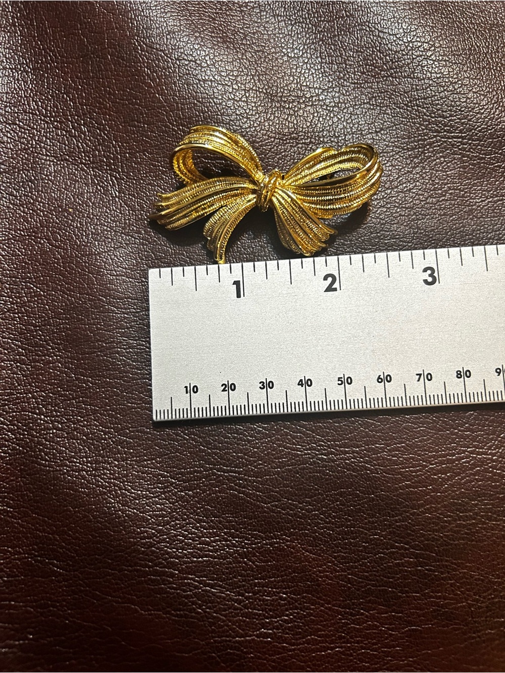 Gold-Tone Bow Brooch - Elegant Women's Jewelry